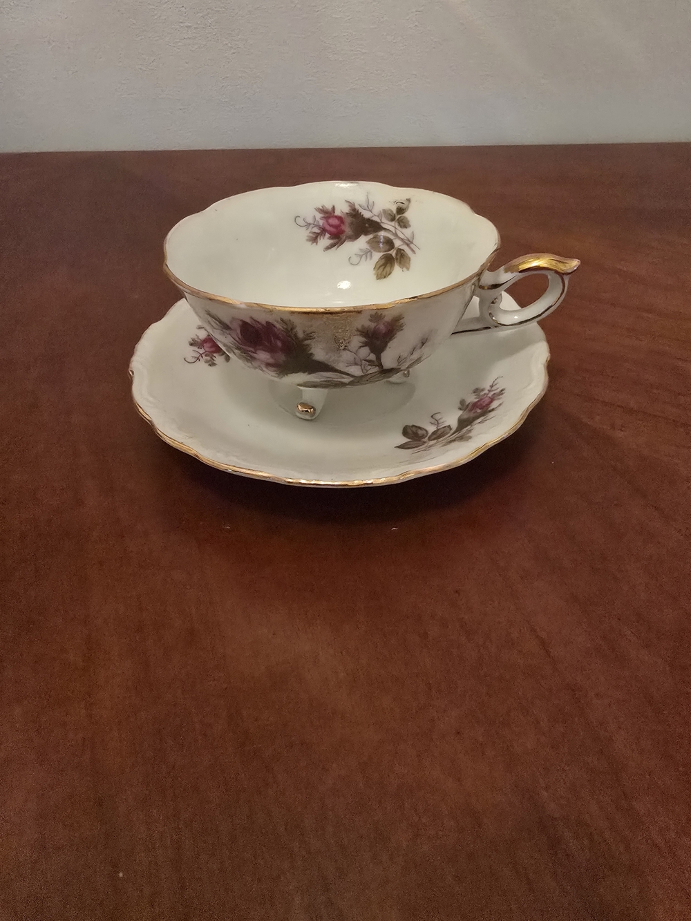 Vintage Floral Tri Footed Teacup and Saucer with Gold Trim - "Moss Rose"